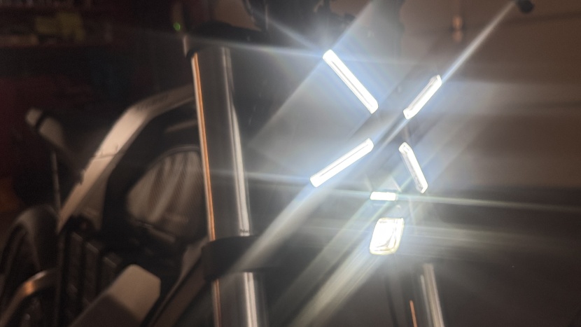 the x works as a daytime running light, while the light beneath...