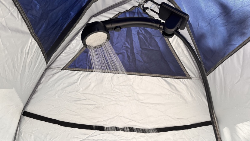 the caddis shower tent rapidly deploys and is packed with features...