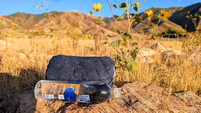 comparing the therm-a-rest's packed size against a one liter water...