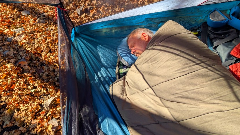 a stretchy air bladder, thick layer of down batting, and five inches...