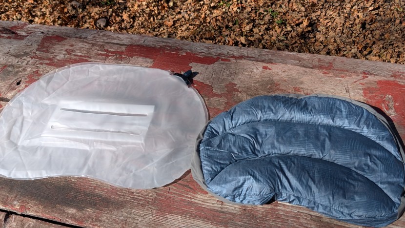 a stretchy air bladder, thick layer of down batting, and five inches...