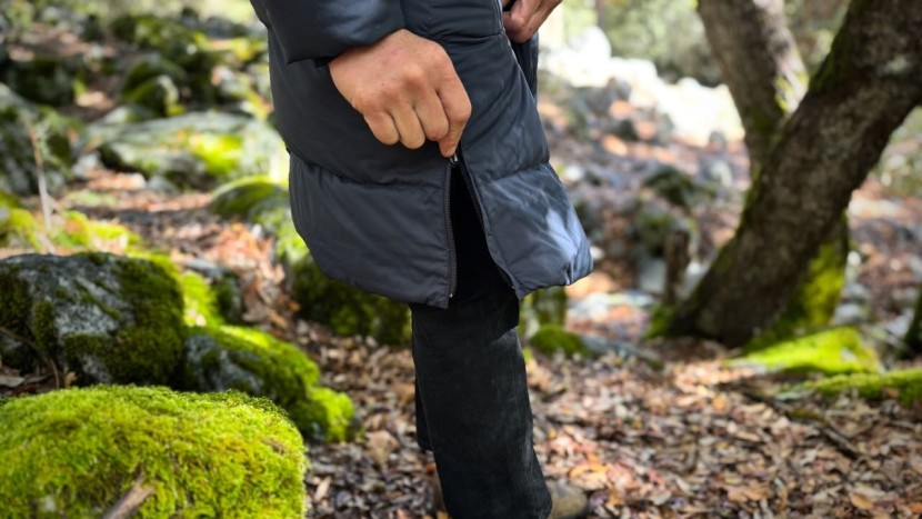 the two-way main zipper, along with zippers running  along each...