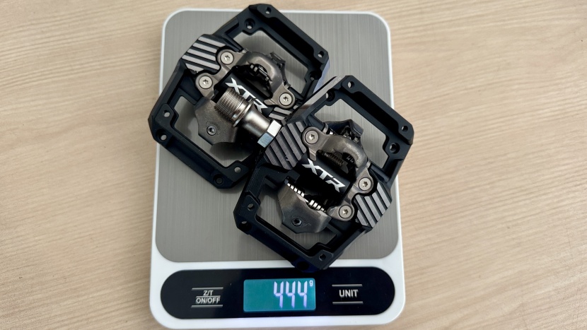 shimano xtr m9220 pedal - 444 grams per pair before the installation of traction pins.
