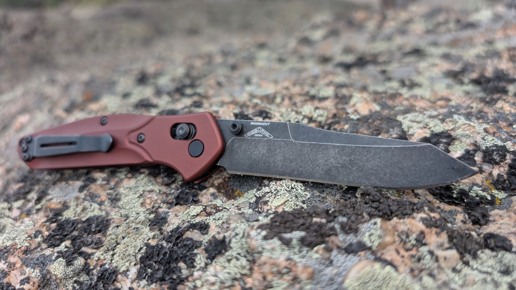 benchmade 940 osborne - the prominent downward chisel of the blade tip is referred to as a...