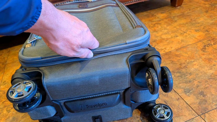 the travelpro's flared expansion system is wider at the bottom than...