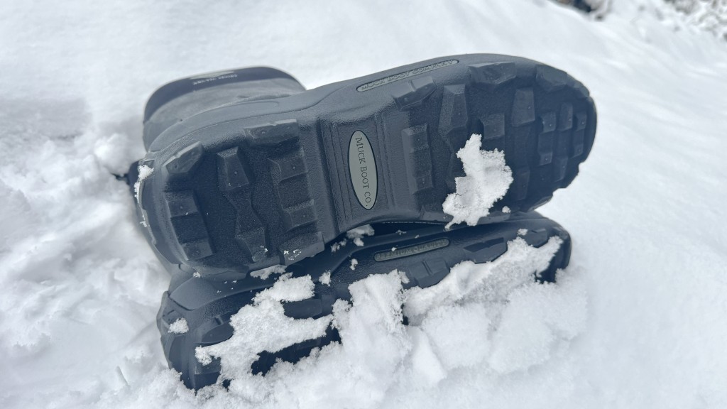 muck boot arctic sport mid - sticky snow can stick to the soles of these boots, but the...