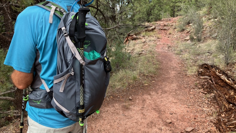 osprey sportlite 25 - the trekking pole tips slide into a small nylon loop at the pack's...