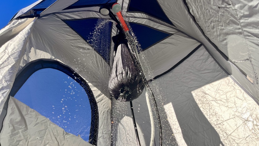 the caddis shower tent rapidly deploys and is packed with features...