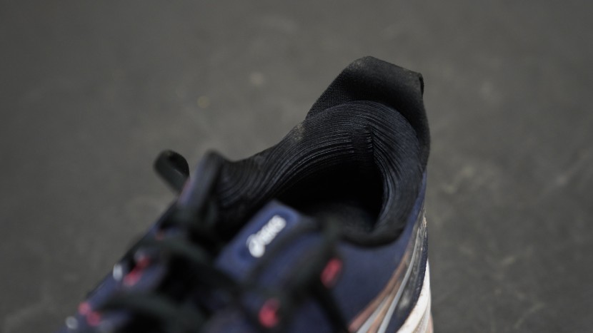 the gel-kayano features a heel pull tab to assist with putting them...