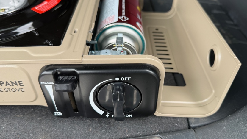 open the side compartment, slide in the butane canister, and you are...