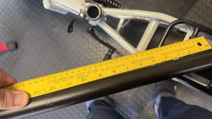 lectric xp4 - the seatpost has 12" of adjustability.